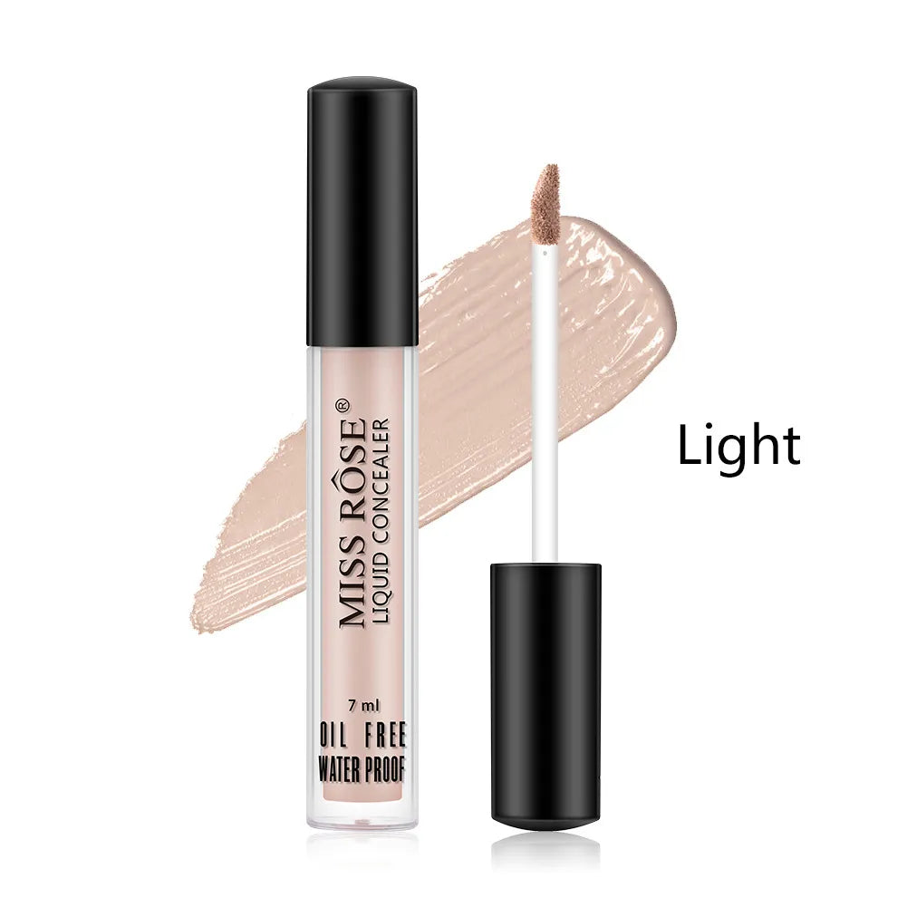 Close-up view of a concealer stick with creamy formula visible on tip