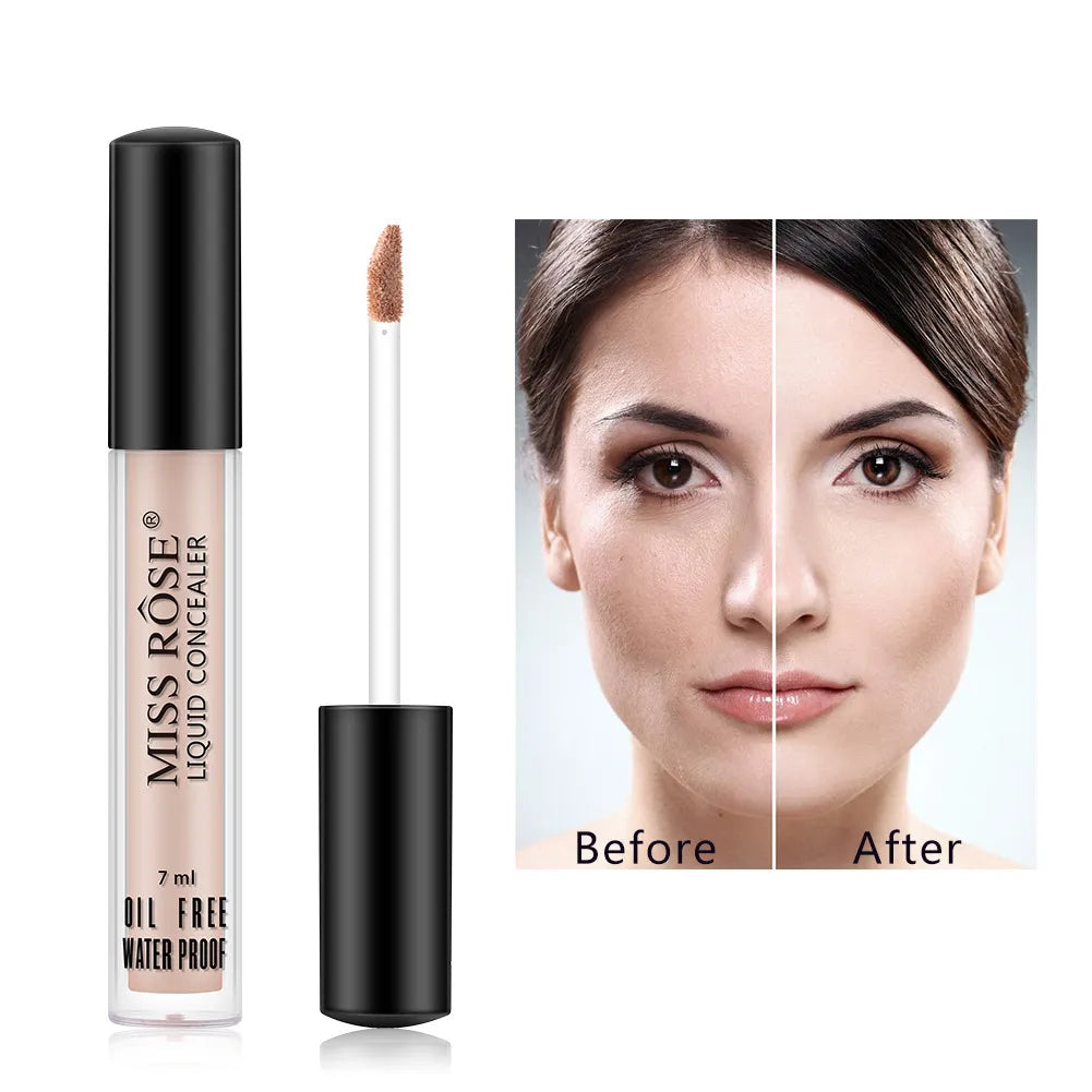 Hand holding concealer stick applying product to under-eye area