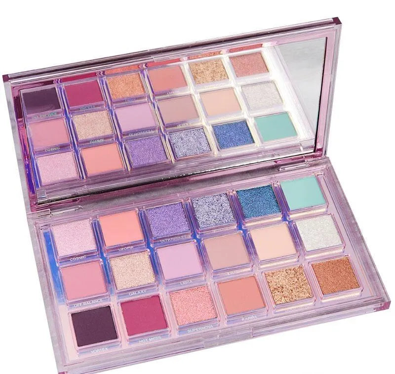 Close-up view of matte and shimmer eyeshadow finishes in the palette