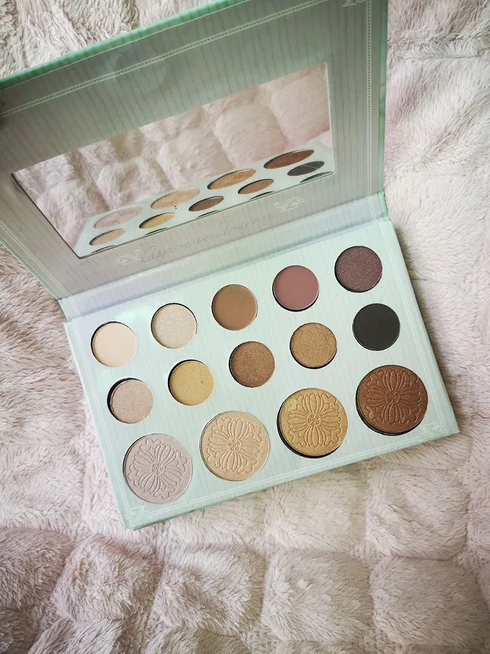 Swatch demonstration of eyeshadow and highlighter shades on skin