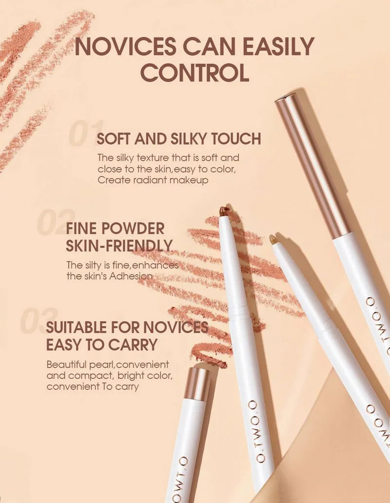 Hand holding an eyeshadow pen applying color to eyelid for demonstration