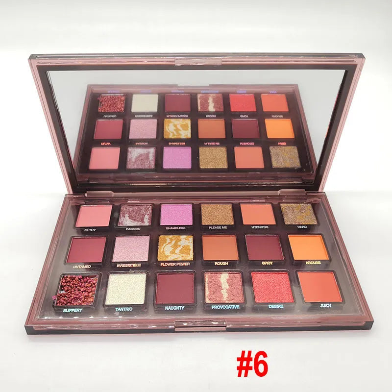 Open 18-color eyeshadow palette showing matte and shimmer shades