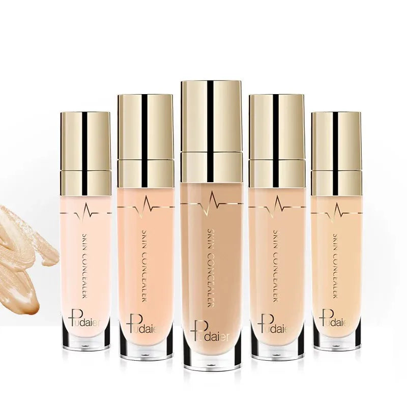 Close-up of concealer being blended on hand to show texture