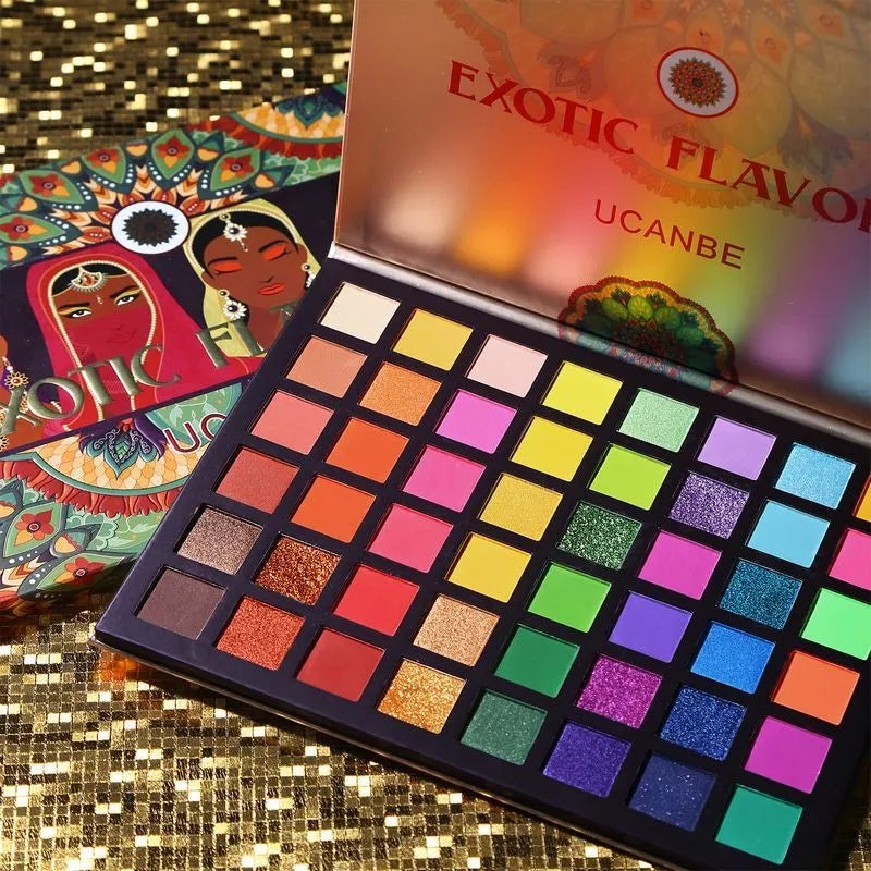 Close-up view of green and metallic eyeshadow shades in palette