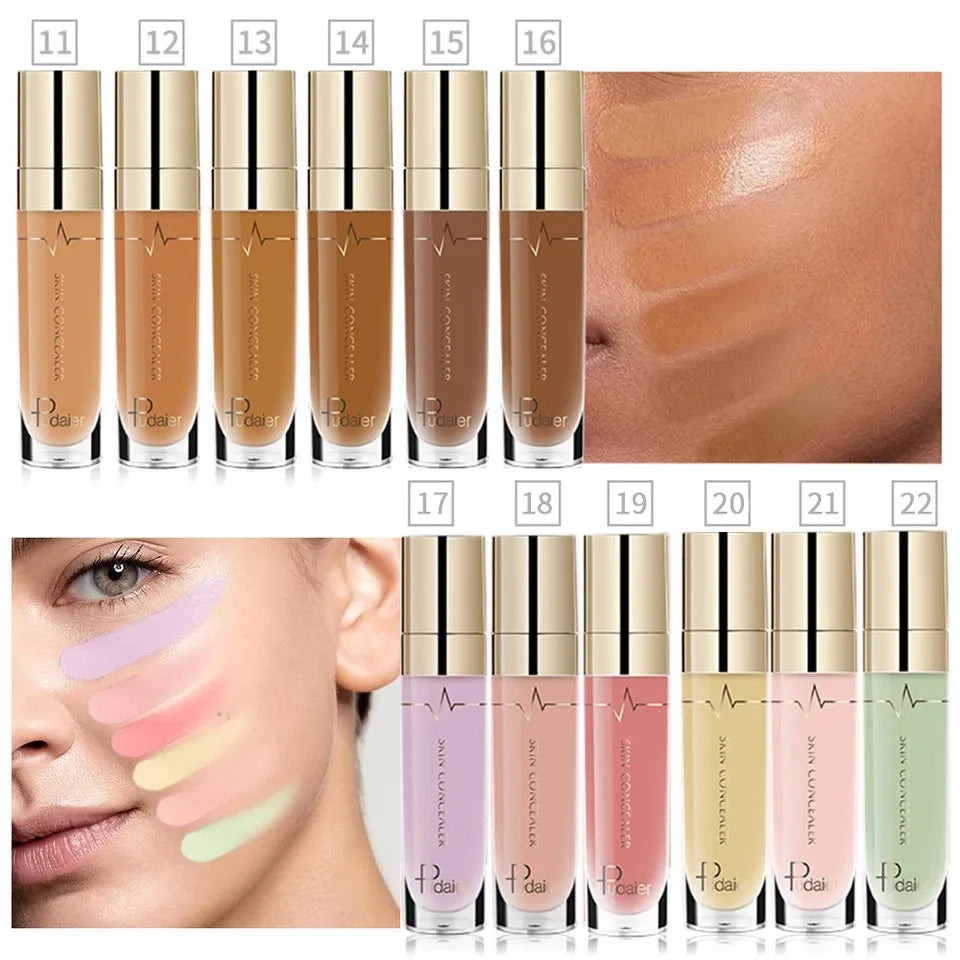 Liquid concealer bottle with doe-foot applicator on clean surface