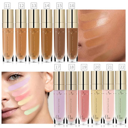 Liquid concealer bottle with doe-foot applicator on clean surface
