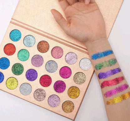 Close-up view of pressed powder eyeshadow with glitter particles visible