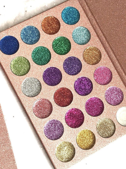 Close-up view of pressed powder eyeshadow with glitter particles visible