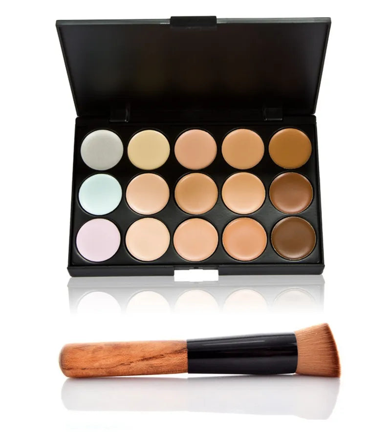 Complete concealer set with palette and brush displayed on neutral background