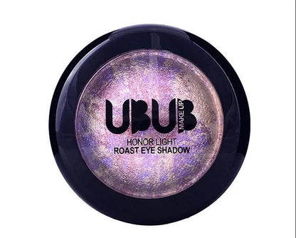 Close-up view of eyeshadow palette with matte and glitter finishes