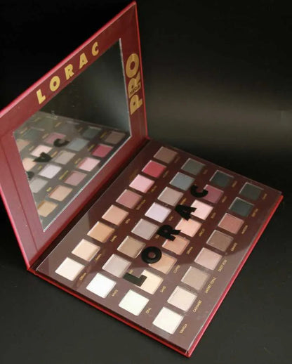 Close-up view of eyeshadow palette with smooth, pigmented powder textures