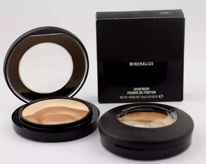 Application of the eyeshadow on an eyelid with a makeup brush