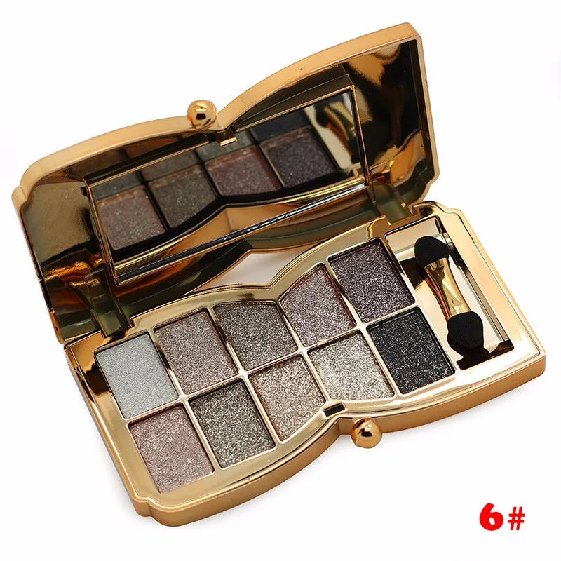 Front view of 10-color gold smoky eyeshadow palette with glitter finishes