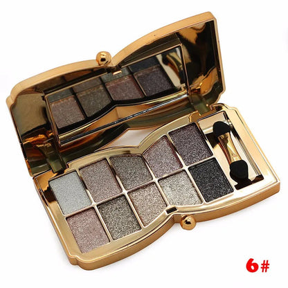 Front view of 10-color gold smoky eyeshadow palette with glitter finishes