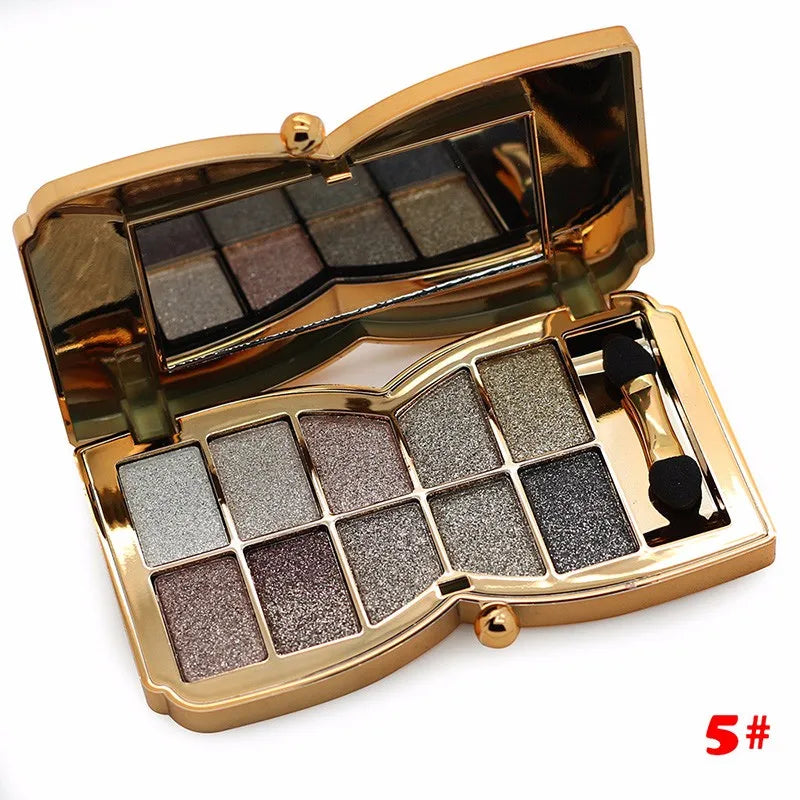 Open palette showing 10 complementary gold-toned eyeshadow shades
