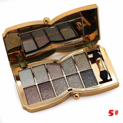 Open palette showing 10 complementary gold-toned eyeshadow shades