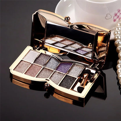 Front view of 10-color gold smoky eyeshadow palette with glitter finishes