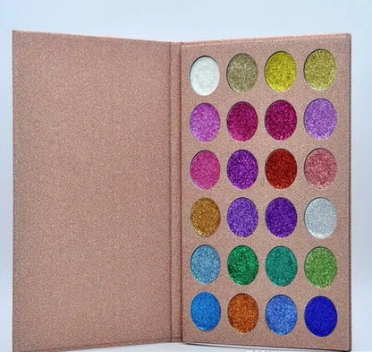 Open eyeshadow palette showing 24 glitter shades in organized layout