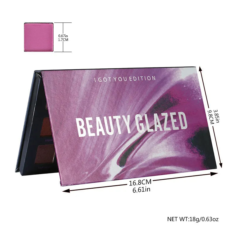 Front view of an 18-color eyeshadow palette showing rose gold and neutral shades