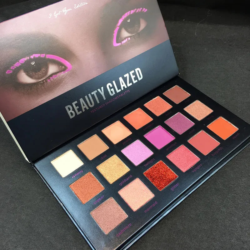 Close-up of eyeshadow shades in the palette for detailed color and texture view