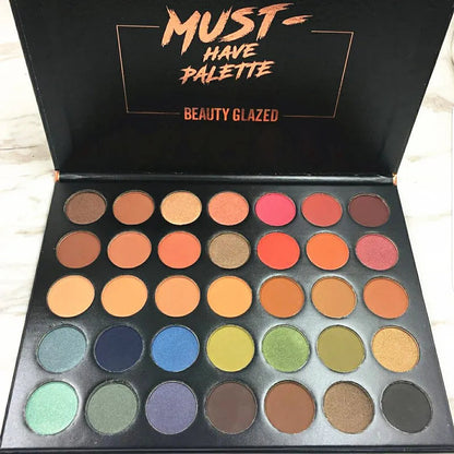 Close-up view of eyeshadow shades showing texture and color variety