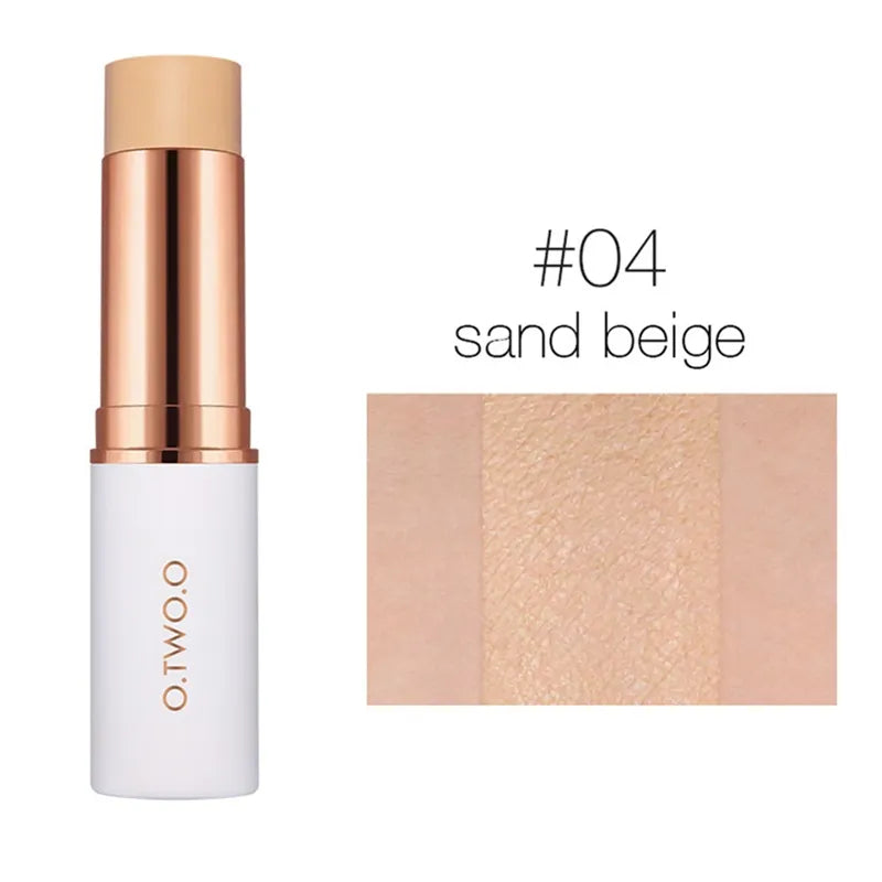 Close-up of a concealer stick being applied to the face