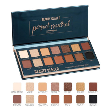 Matte eyeshadow palette with glitter shades in warm colors, open view