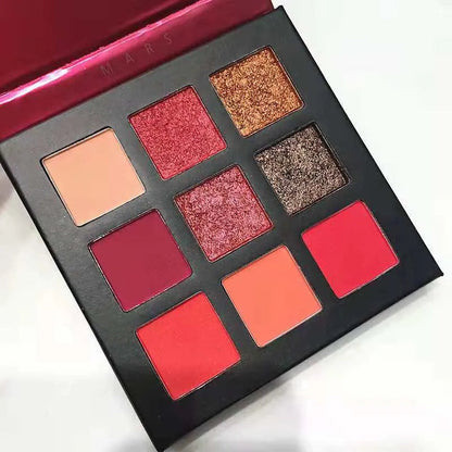 Close-up view of eyeshadow shades showing shimmer and metallic textures