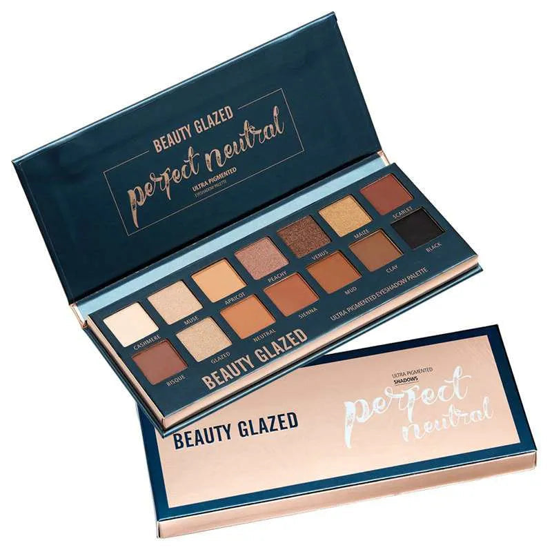 Matte eyeshadow palette with glitter shades in warm colors, open view