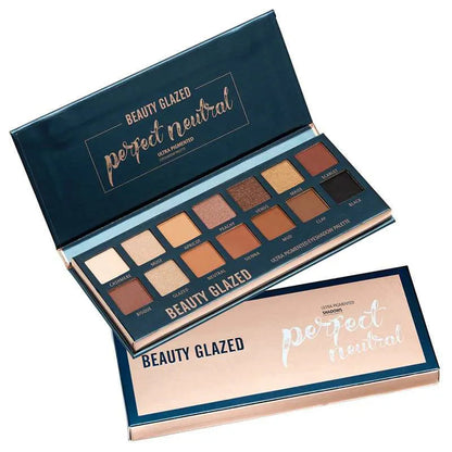 Matte eyeshadow palette with glitter shades in warm colors, open view