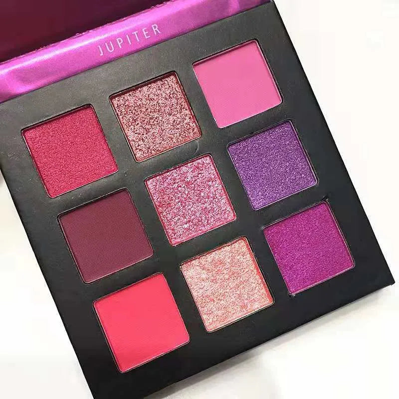 Compact eyeshadow palette with 9 shimmer and metallic colors arranged in a grid