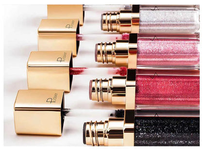 Swatch display showing 18 different eyeshadow colors on skin