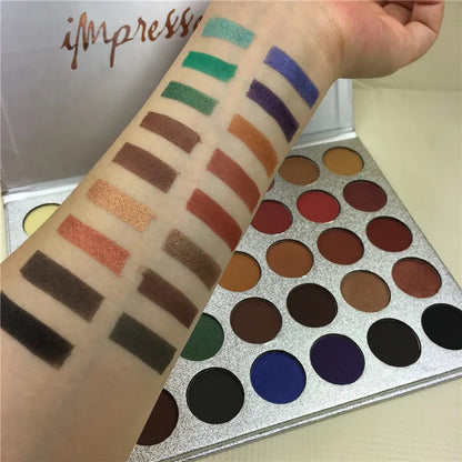 Eyeshadow palette in use with brush application on eyelid