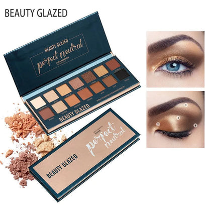 Eyeshadow palette compact with 14 color pans displayed