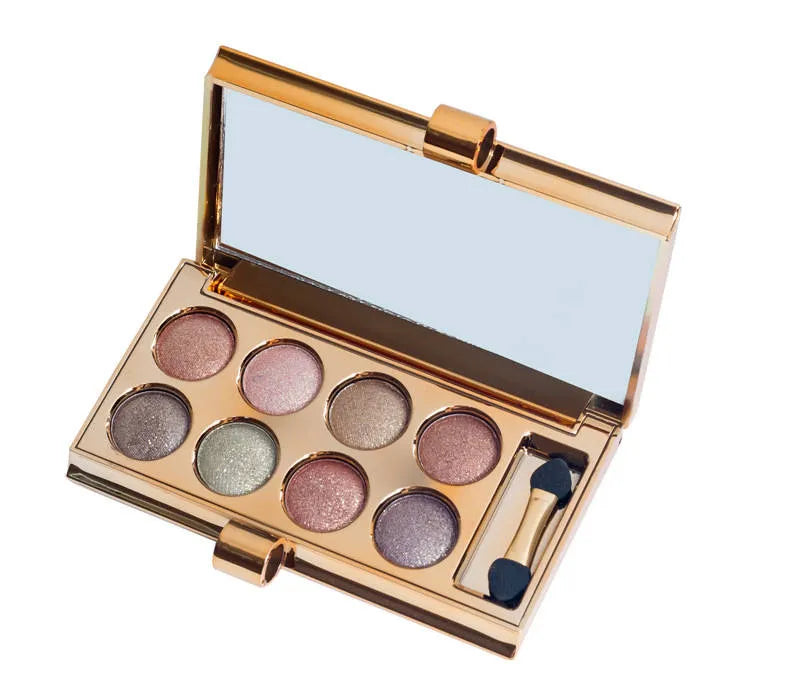 Close-up of eyeshadow application showing glitter finish on eyelid