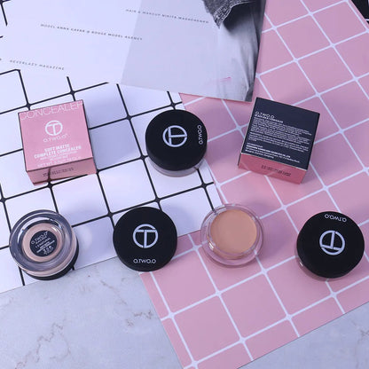 Close-up view of creamy concealer texture on skin