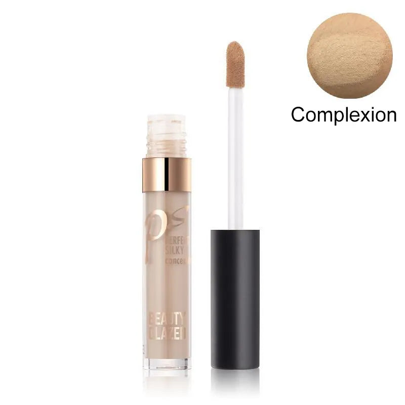 Hand holding concealer palette with two complementary shades visible