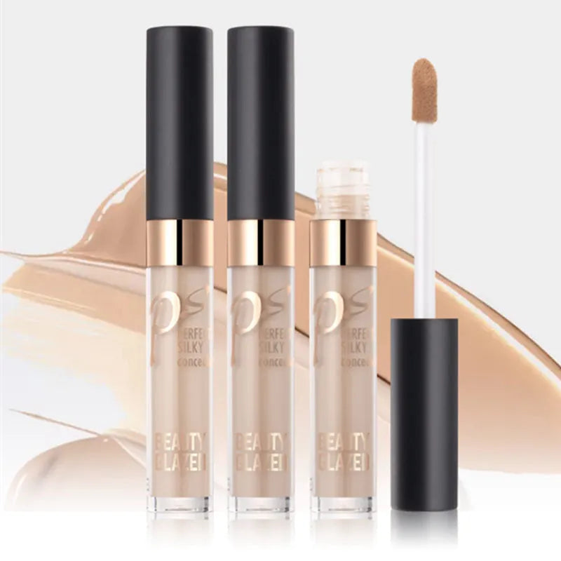 Open cosmetic palette showing two cream concealer shades in round pans
