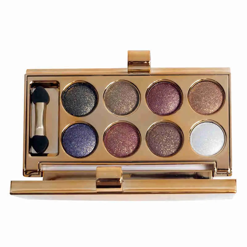 Open warm-toned eyeshadow palette showing eight shimmer shades