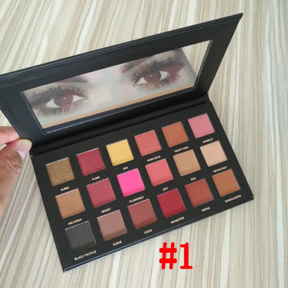 Close-up view of eyeshadow palette with color swatches displayed