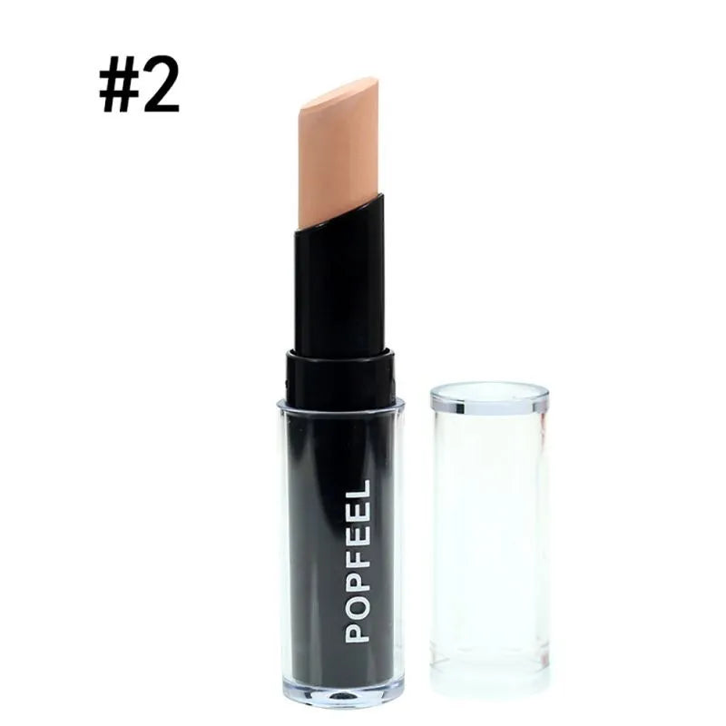 Set of multiple concealer sticks arranged in display case