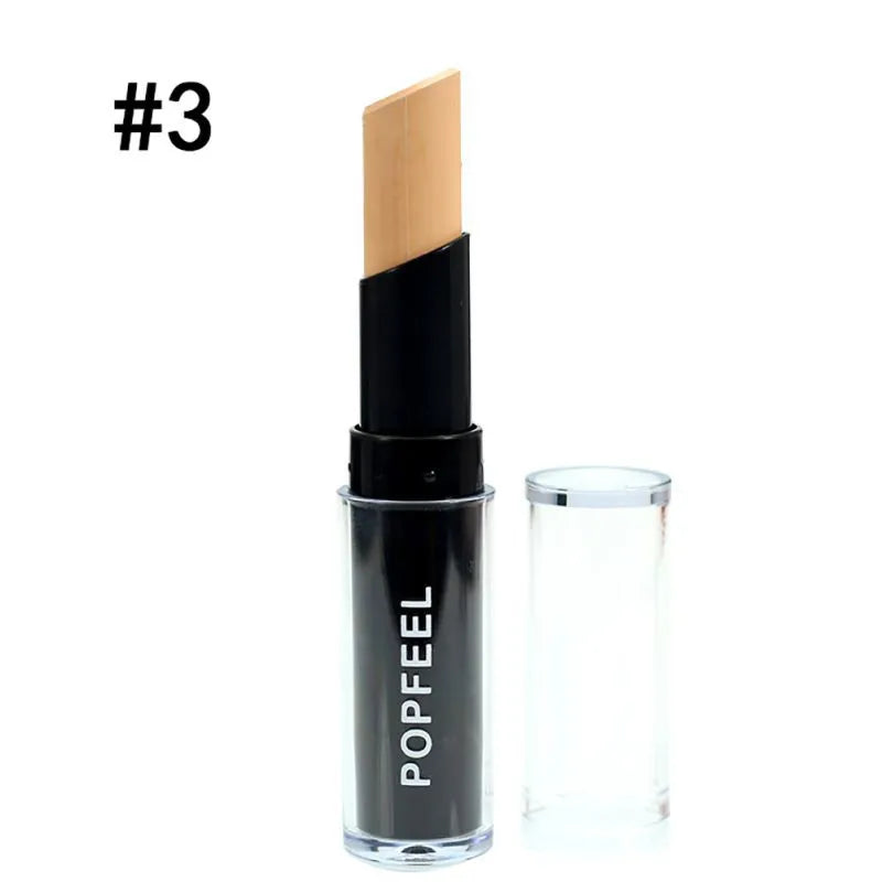 Close-up of concealer stick with creamy texture visible