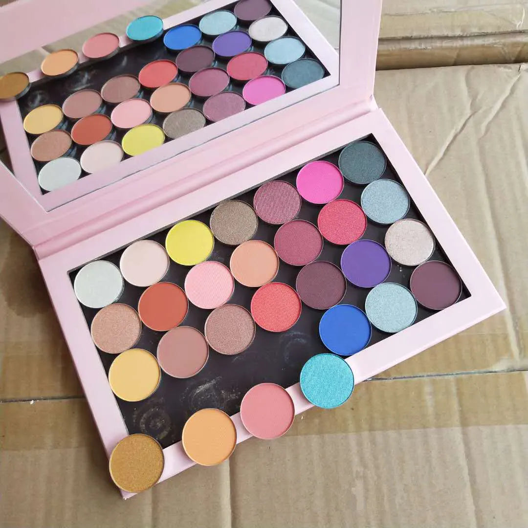 28-color eyeshadow palette showing various pink and neutral shades