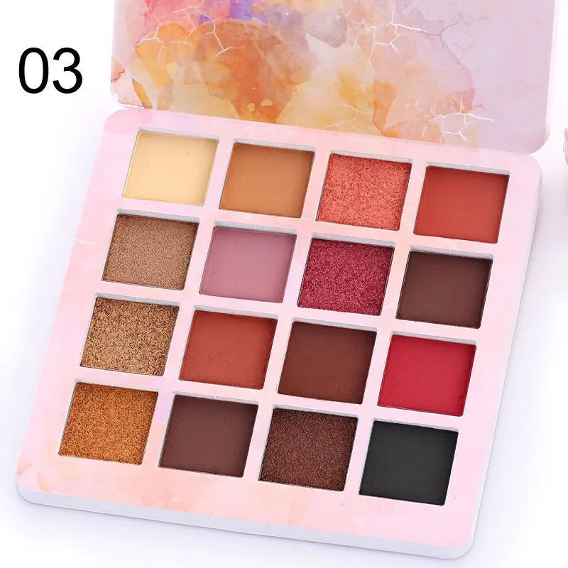 16-color eyeshadow palette showing matte and glitter shades in open case