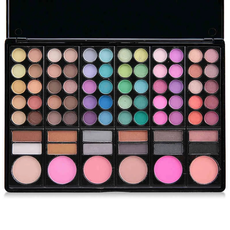 Close-up of eyeshadow palette with various color swatches
