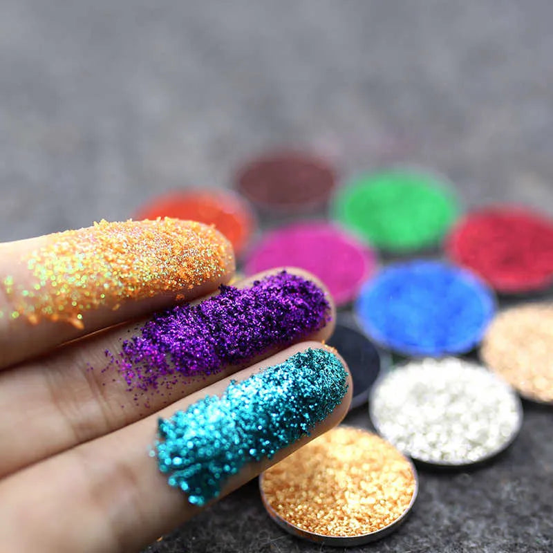 Close-up view of eyeshadow palette with glitter texture detail