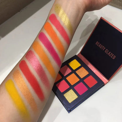 Close-up view of eyeshadow shades showing shimmer and metallic textures