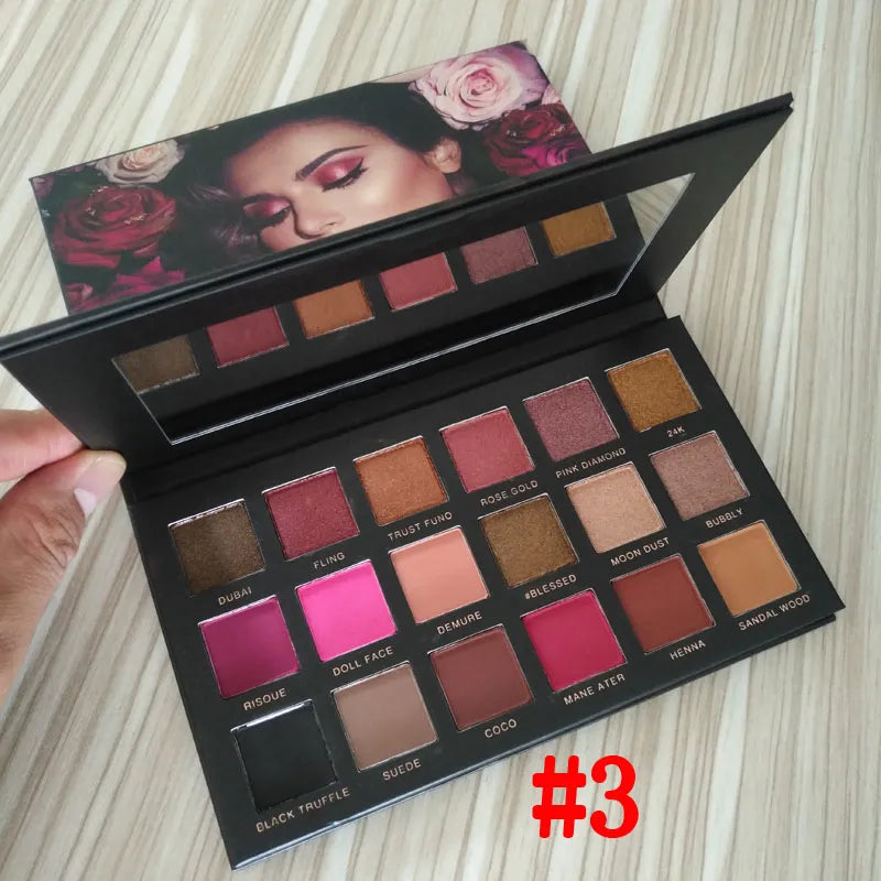 Open 18-color eyeshadow palette showing matte and shimmer shades