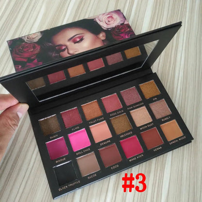 Open 18-color eyeshadow palette showing matte and shimmer shades