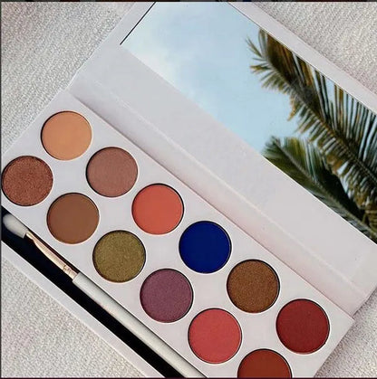 Swatch of matte eyeshadow shades from the palette on skin